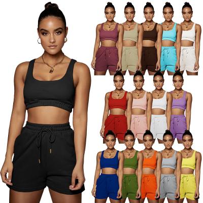 China Womens Cycling Sportswear Women Breathable Outfits Tie Up Sleeveless Crop Top Pocket Set Joggers 2 Piece Crop Top Pants Two Piece Set for sale