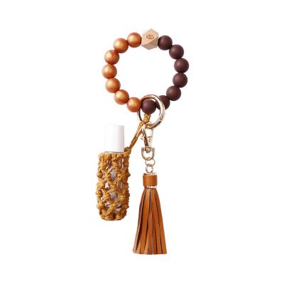 China Popular Design Key Chain With Portable Keys Ring Holder Car Bedroom Beaded Wristlet Keychain Silicone Key Bottle Holder for sale