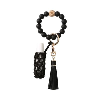 China Key Chain Women Beaded Bracelet Key Chain Designs Silicone Key Ring Bracelet Wristlet Leather Tassel With Wooden Beads for sale