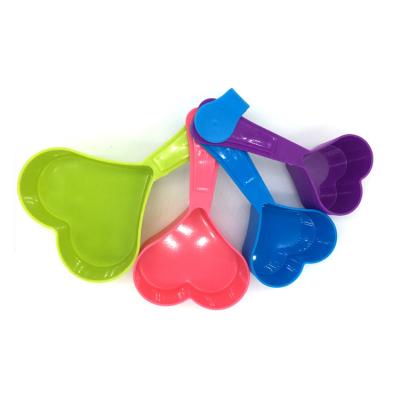 China Heart Shape 250ml 125ml 80ml 60ml Viable Colorful Cooking Plastic Tools Measuring Cups And Spoons Set for sale