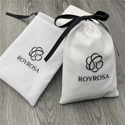 China Recyclable White Velvet Packaging Bag With Ribbon Bow , Drawstring Velvet Gift Bags For Cosmetic for sale