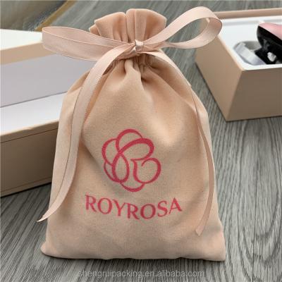 China Recyclable Pale Pink Velvet Cosmetic Bag Custom Velvet Makeup Bag With Bow for sale