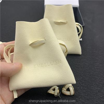 China Luxury Beige Drawstring Suede Jewelry Bags Drawstring Bag Velvet Microfiber Jewelry Packaging Gift Pouch for sale