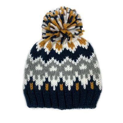 China JOINT Custom Acrylic Jacquard Pattern Beanie Kids Knitted Hat With Yarn Pompom for sale