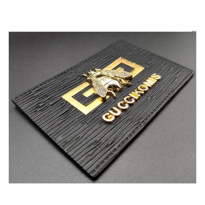 China Hot Selling Viable Hot Selling Fancy Garment PU Leather Label Custom Leather Deft Butterfly Metal Metal Label for sale