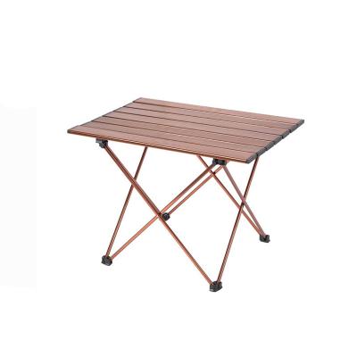 China 2022 Modern Style Portable Outdoor Folding Folding Table Picnic Raising Table Folding Roll Up Table for sale