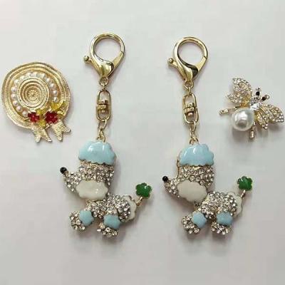 China Pointback Crystal Rhinestone Pin Brooch Embellishment Plated Alloy Water Drop Shaped Blue Brooch for sale