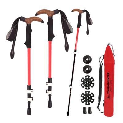 China New design 3 sction carbon fiber folding portable alpenstock external lock flared handle ski-lover cork shockproof trekking poles for sale