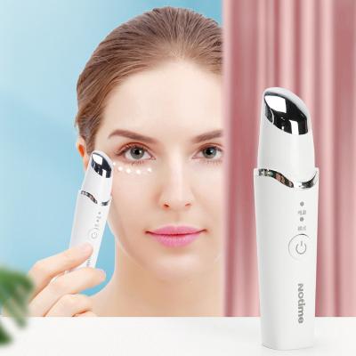 China Vibration hot face and eye area massage notime heat home use beauty circle dark eye massager facial device for sale