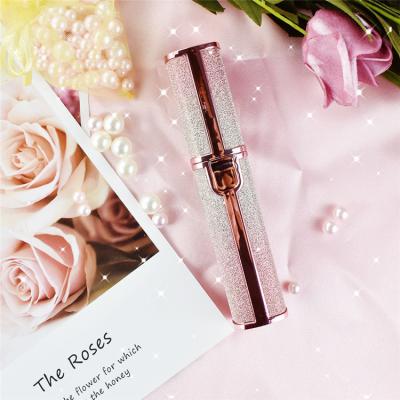 China Mini Micro Current Drop Shipping Gold Plated Face Beauty Care Automatic Eyebrows Epilator Electric Eyebrow Trimmer for sale