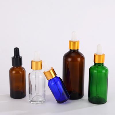 China High Quality 5ml 10ml Clear/Amber Glass Essential Oil Bottle 30ml 50ml Glass Dropper Bottle With Gold Cap For Aroma Perfume Oil for sale