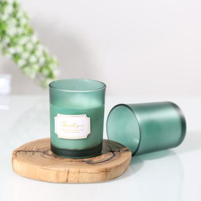 China Eco-friendly Recyclable New Type Sell Well Home Luxury Light Green Glass Candle Jar With Lid for sale