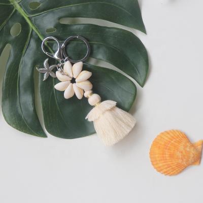 China Home Decoration Metal Cowrie Shell Key Chain Natural Shell &Conch Shell Crafts and Gifts Tourism Souvenirs for sale