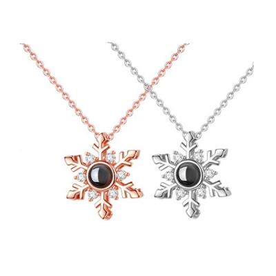 China Lead Free Shiny Silver Projection Necklace 100 Snowflake Pendant Necklace Of Languages ​​I Love You for sale