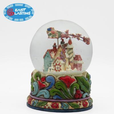 China Custom Europe 100mm Christmas Glass Snow Globe Kit With Blowing Snow for sale