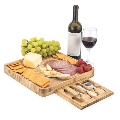 China Sustainable Charcuterie Board And Knife Set Cheap Cheese Board Set Latest Arrival Design Bamboo Cutting Plates Natural Bamboo Color New for sale