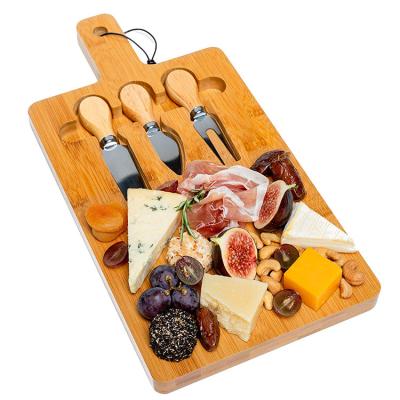 China Large Sustainable Bamboo Cheese Cutting Dishes Board Set Rectangular Cheese Dish With Handle for sale