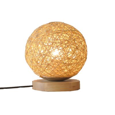 China Asian Romantic Wood Shade Round Globe Ball Rattan Lamp Bedside Lamp Table Living Room Decorative Desk Lamp for sale