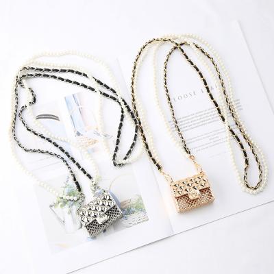 China Mini Metal Stain Fashion Diamond Earphone Bag Small Chain Pearl Perfume Neck Decoration Hanging Waist Bag Hollow Waist Bag for sale