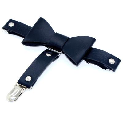 China Hot-selling European and American punk bow PU stock anti-sexy leather leg buckle garter socks bow garter belt for sale