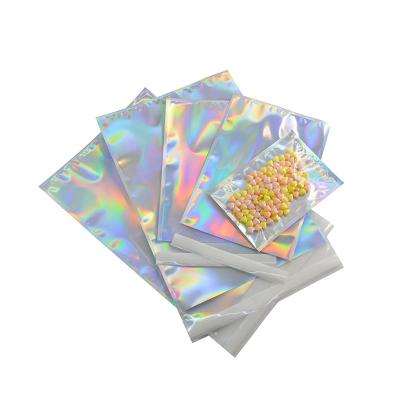 China Clear Moisture-proof Self-adhesive Front Seal Packaging Phone Case Holographic Jewelry Bag for sale