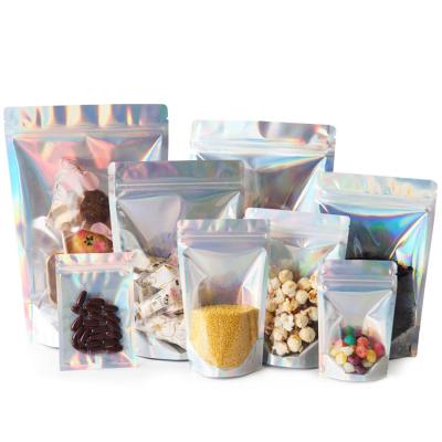 China Moisture Proof 100 Pcs Food Grade Stand Up Smell Proof Zip Lock Holographic Bags With Clear Front for sale