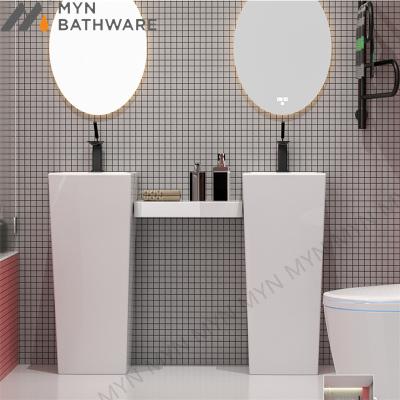 China Unique High Quality Ceramic Bathroom Sink Design Pedestal Wash Basin One Piece Freestanding Basin for sale