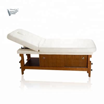 China Good Quality Adjustable Head Solid Massage Bed Beauty Bed Wellness Salon for sale