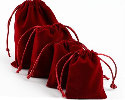 China Drwastring Small Flannel Jewelery Bag Velvet Drawstring Pouch Jewelry Storage Packaging Bag for sale