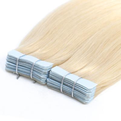 中国 100% natural brazilian remy double drawn hand tied blonde invisible tape in hair extensions human 販売のため