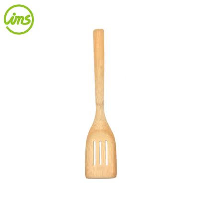 China Sustainable Bamboo Kitchen Stir Fry Cooking Spatula With Hole for sale