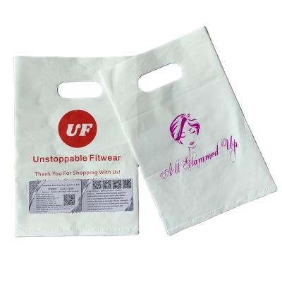 China Customized biodegradable biodegradable plastic die cut portable logo shopping bags plastic bags clothing bags for sale