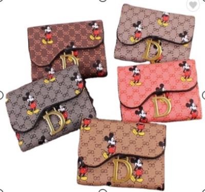 China New Waterproof Ladies Small Mouse Wallet Women Short 30% Off Student Korean Change Women Card Case Wallet for sale