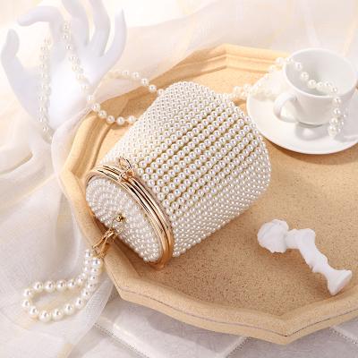 China Harmless Wholesale Small Fashion Web Celebrity Web Clutches Luxury Ladies Pearl Evening Bag And Clutches for sale