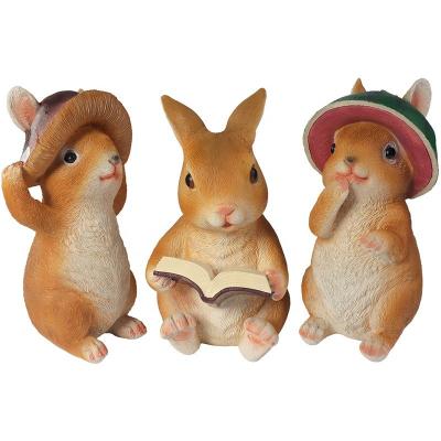 China Antique Poly Garden Decotation Resin Easter Bunny Garden Decoration Rabbit with Carrot for Home Decor or Decorative Garden for sale