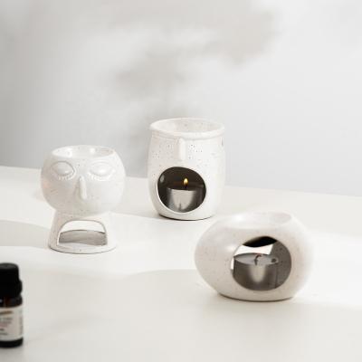 China Morden Modern Design Fragrance Wax Melt Warmer Tealight Ceramic Candle Holder Oil Burner for sale