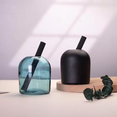 China Fashionable New Design Multicolor Unique Empty Reed Diffuser Shape Essential Oil Glass Perfume Bottle Aromatherapy for sale