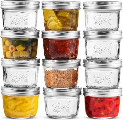 China Wholesale 4oz 8oz 16oz Hot Sale Microwavable Clear Mouth Glass Mason Jar Canning Food Storage Wide Jar With Metal Lid for sale