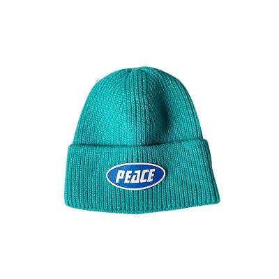 China COMMON Winter Warm Knitted Hat Accept Custom Logo Core-spun Yarn Pure Color Knitted Hat for sale