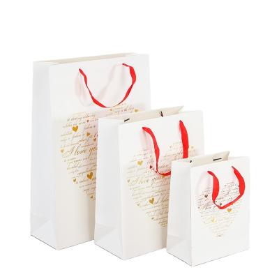 China Paper Bags Recyclable Wedding Paper Bags With Your Own Logo Paper Suitcase With Ribbon Handle for sale