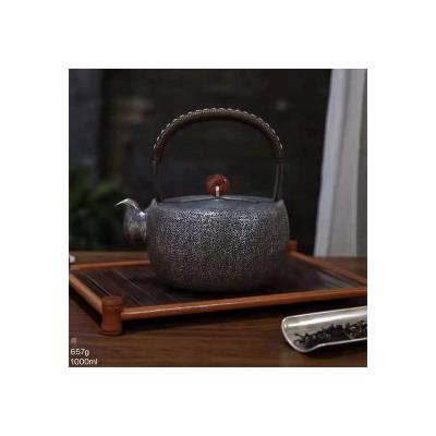 China Viable Chinese Ancient Handmade Crafts Traditional Rock Style Kettle Teapot for sale