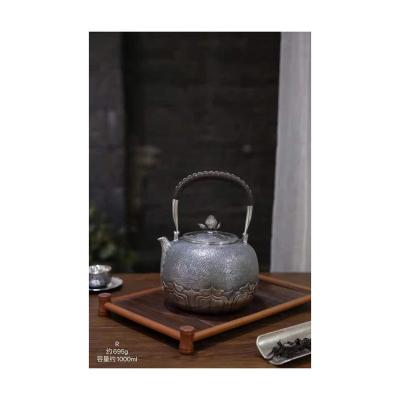 China Viable Exquisite Gift Teapot 999 Standard Silver Handmade Boiling Water Pot With Lotus Bottom for sale