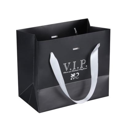 China Custom Recyclable Luxury Hot Money Bags Kraft Paper Bag Small Package Gift Black Shopping Bag With Soft Ribbon Handle for sale