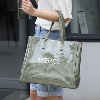 China Wholesale New Fashion Jelly Clear Plastic PVC Tyvek Beach Tote Bag Customized Logo Luxury Shopping Bag Folder Wholesale for sale