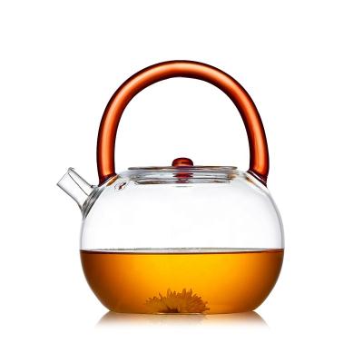 China Viable Heat Resistant Glass Teapot With Color Glass Kettle Handle Customized Clear Tea Maker for sale