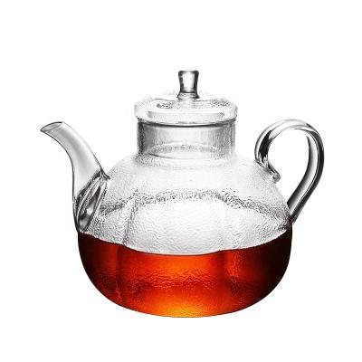 China Large Capacity Sustainable Glass Teapot With Hammer Pattern Effect Body for sale