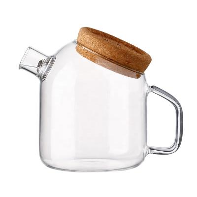 China Viable creative glass teapot with cork on the oblique tip of the cylindrical cold kettle for sale