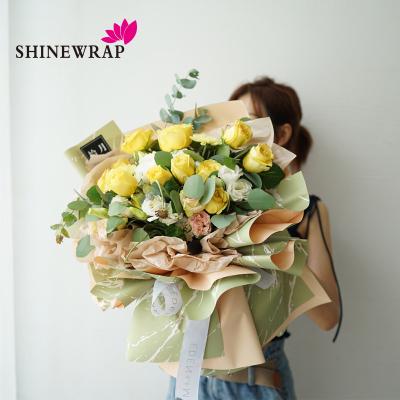 China New Waterproof Paper Flower Wrapping Paper Gift Wrapping Paper Bouquet Waterproof Double Sided Wrapping Material for sale