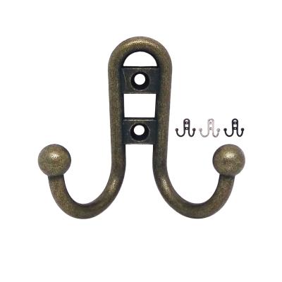 China Sustainable Heavy Duty Vintage Rustic Zinc Cast Iron Double Fork Robe Wall Hook in Antique Brass for sale