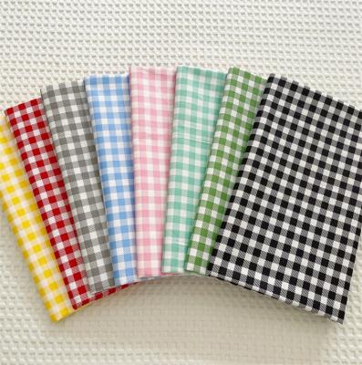 China Plaids 100% twill fabric pattern low moq plaid cotton viable wholesale cotton red green pink fabrics for sale